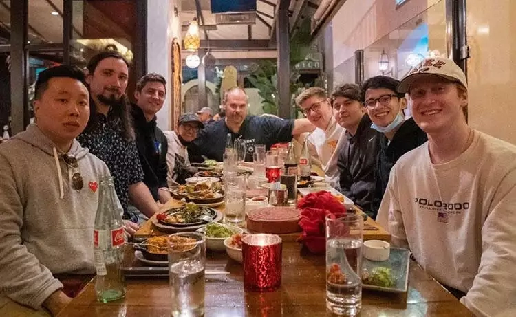 Pictured: Marco Meru (middle) and Nate Schanker (right, end) hanging out with the now-former XSET Valorant team. Credit: Nate Schanker