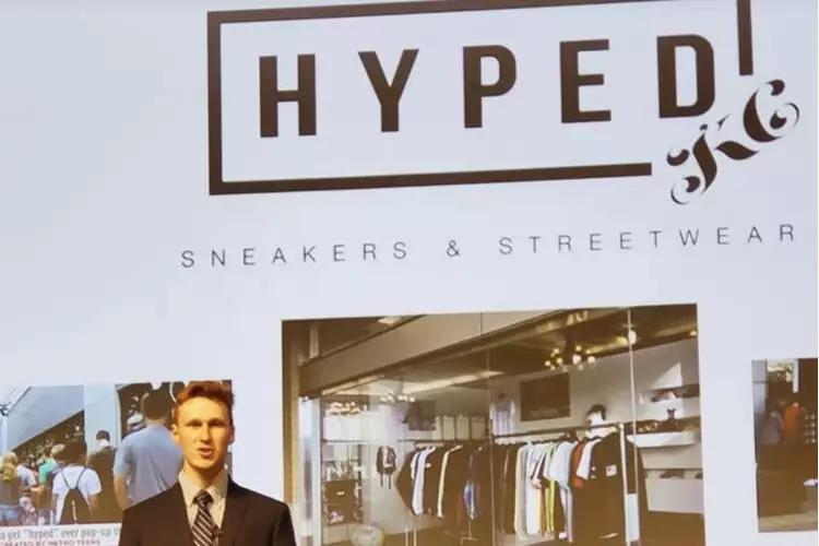 A young Nate Schanker outside his pop-up store, Hyped KC