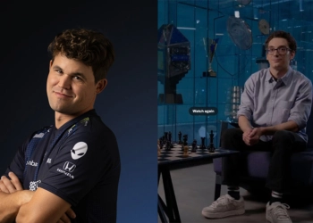Team Liquid signs professional chess players Magnus Carlsen (l) and Fabiano Carauna (r).